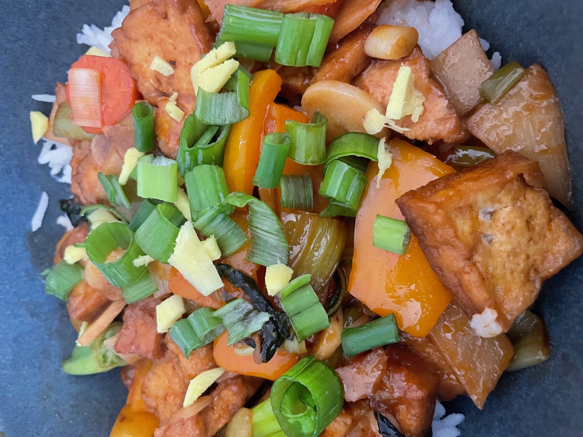 a delicious-looking tofu dish with stir-fried vegetables and a lovely spicy sauce (all vegan, contact me if you want the recipe)
